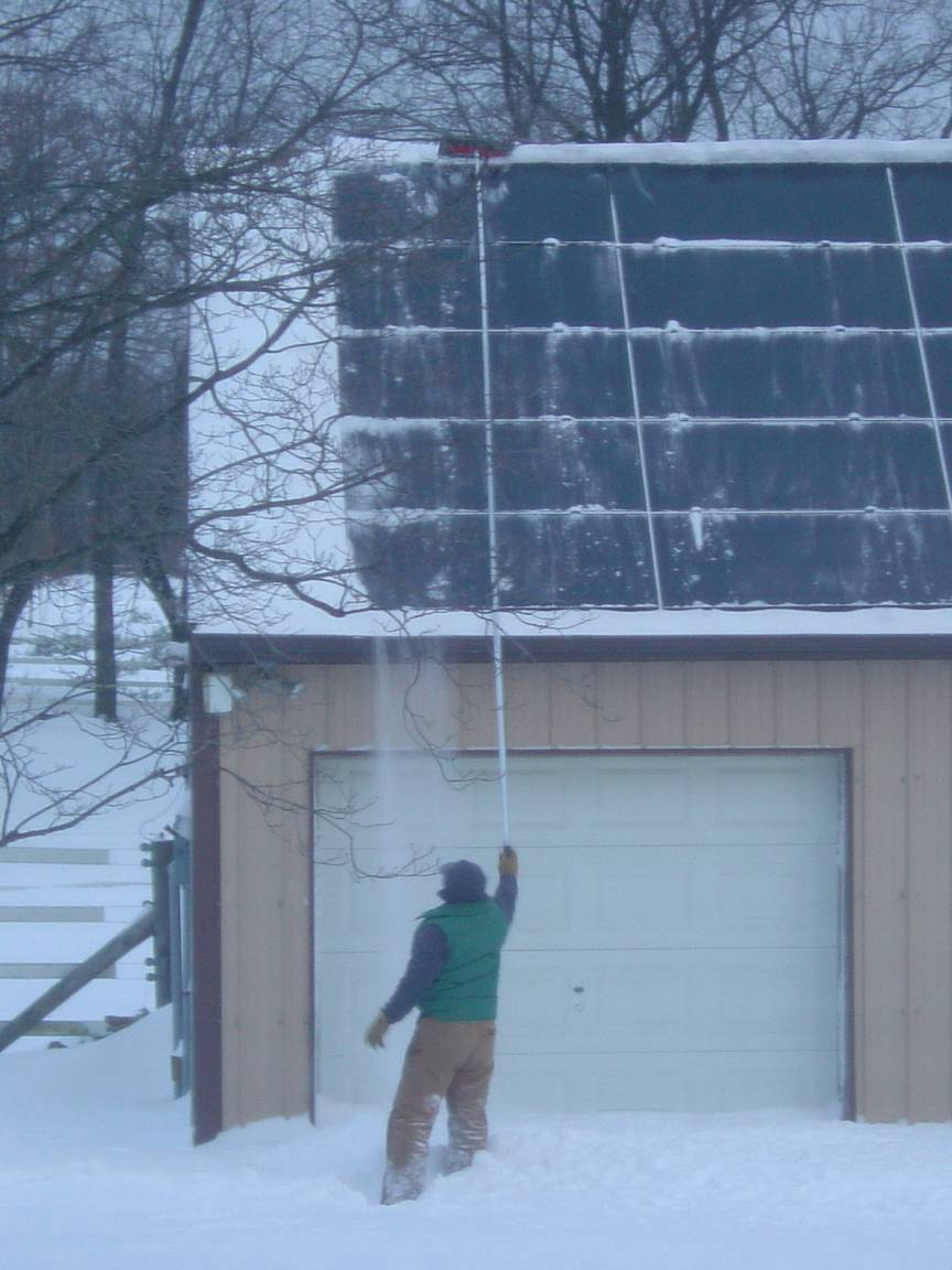 Clearing Snow from Solar Panels - Is it worth it? 