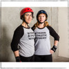 This is the original Strong Athletic Woman Baseball T-shirt by Strong Athletic, first produced in 2014 for the Roller Derby World Cup in Dallas, Texas. Originally Strong Athletic was simply an idea and a phrase. Founder Nadia Kean would call teammates a "fine group of strong, athletic, women". Fellow teammate Cristen Perks was learning how to create art on adobe illustrator and screen print it on to shirts and hoodies. As a gift for Christmas in 2013 she put the three words on a gray shirt, stacked and in alignment in bold white ink. The shirt read, "Strong Athletic Woman". That Christmas gift changed Nadia's life, but at the time, it wasn't apparent how it would happen. In 2014 Nadia asked Cristen if she could print a run of the shirts for friends who wanted one. That year in June Cristen made about 60 shirts and Nadia sold them at Philly Roller Derby's very popular WFTDA sanctioned tournament ECDX. All of these shirts were unbranded, so just the three words on the front but no art otherwise. From then, they decided to brand the shirts, and used the name that Nadia coached under- Get Smarty Coaching. That's why these shirts say Get Smarty Coaching on them, rather than Strong Athletic. In 2015, Nadia and Cristen decided to separate Get Smarty Coaching from Strong Athletic and Nadia hired Angel Ortega to design the Strong Athletic logo. Since then all of our shirts have had the Strong Athletic logo on both the front and the back. So, if you ever see a Tultex grey t-shirt with Strong Athletic Woman printed o them, it's an original. If you see one with the Get Smarty Coaching logo on it, it's the second-generation  of our shirts, and if you see shirts with the Strong Athletic logo you know that it's part of the third generation of our shirts. 