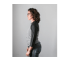 This is a side view of our Strong Athletic Coach Baseball T-shirt. The body of the baseball t-shirt is grey and the sleeves are black. This baseball t-shirt cuts a bit lower and is an all gender design.  
