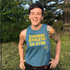 This is the front of the Strong Athletic Skater Heather Teal Racerback Crop Top with Yellow Ink. This crop is often referred to as a "starter crop" because it isn't cropped as high as other crops might be. This shirt comes in sizes S-2XL. #strongathletic , #strongathleticskater , #strongathleticskaters , #rollerderby