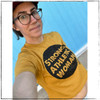 This is the front of our new crop top t-shirt that is designed to have a loose fit. This design is printed on a mustard sunflower yellow fabric with black ink. The words Strong Athletic Woman are printed in a large circle on the front of the shirt along with the Strong Athletic logo. 