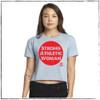 This is the front of the light blue crop top t-shirt with the words Strong Athletic Woman printed inside of a large circle in red ink. The Strong Athletic logo is also featured on the front of this tee. The logo is also printed on the back. This design is printed on a Next Level shirt. 