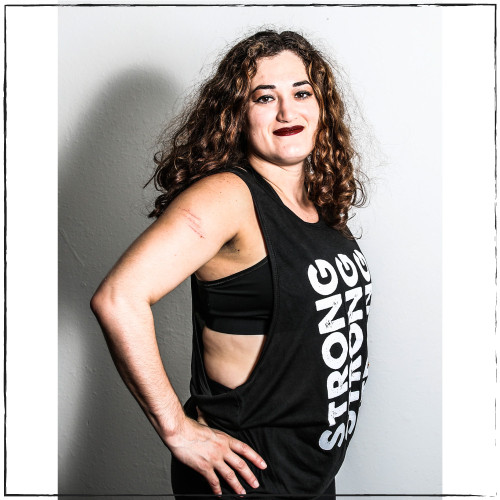Sold Out! The Strong Athletic Woman Drop Arm Muscle Tank Black with Silver  Ink for Female Athletes