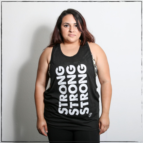 Sold Out! The Drop Arm White Muscle Tank with Black Ink with the words  Strong Written Vertically in Black Ink