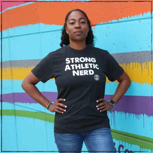 This is the front of the Strong Athletic Nerd Crew Neck T-shirt printed on black fabric with white ink. 