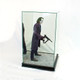 Joker miniature inside figurine display box with black wooden base facing right