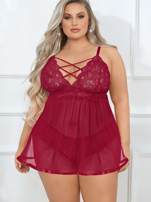 Female plus size model with blonde hair wearing red babydoll lingerie.