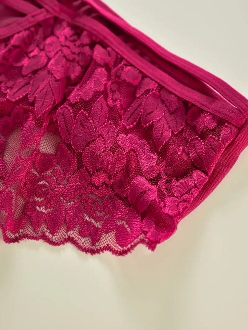 Red lace undies. close up of scalloped lace detail.