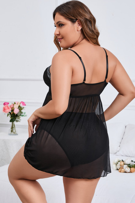 Plus size black baby doll with soft cups, silver trim around the bust-line,  adjustable straps, sheer flowing skirt and matching black undies.