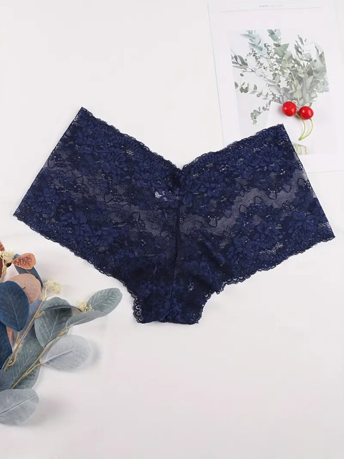 Plus size blue floral lace booty shorts with scalloped edges.
