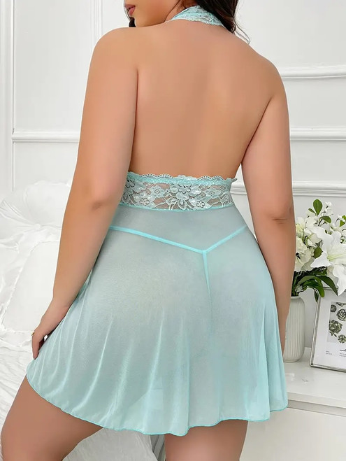 Female lingerie model wearing a light aqua coloured babydoll with lace cups, a sheer skirt area with front split and matching aqua G-String.