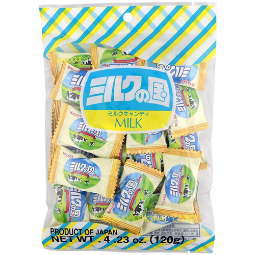 A 4.23 oz (120g) bag of Kasugai Milk Candy from Japan. The packaging features individually wrapped creamy milk candies with illustrations of cows and a pastoral farm scene. The top of the bag has a colorful blue, yellow, and green plaid design, and the central label reads “Milk” in both Japanese and English.