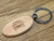 Oval Wooden Keyring with Mk 1 Renault Twingo image engraved on it