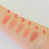 Swatches swatches of each shade of Cheeky Baby on pale skin. From top to bottom, the shades are 01 Apple Red, 02 Apricot Orange, 03 Berry Red, 04 Candy Pink, 05 Compote Pink, 06 Marshmallow Pink.