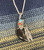Bear Claw & feathers pendant