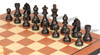 Chessmen in starting position on a minimalist board in a modern room Chessmen in starting position on a minimalist board in a modern room