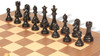 SpruceTek Black & Wood Grain Resin Chess Pieces with Deluxe Walnut Board - 4.25" King
