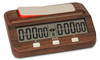 Basic digital chess clock shown in wood grain finish