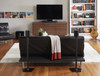 SANUS WSS21 black premium stand elevating Sonos ONE to ear height in contemporary home theater