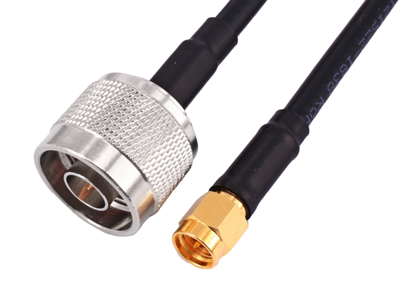 Close-up of Hills Antenna N Male and SMA Male connectors on 5m LL195 patch lead, showcasing secure RF mating and heat shrink protection for telecom