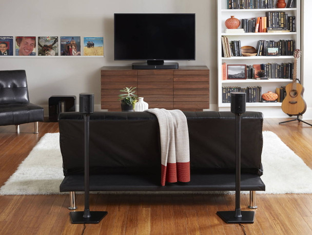 SANUS WSS21 black premium stand elevating Sonos ONE to ear height in contemporary home theater