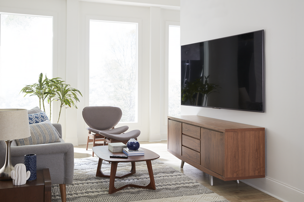 Sanus VLT7 mounted above entertainment unit showing sleek design