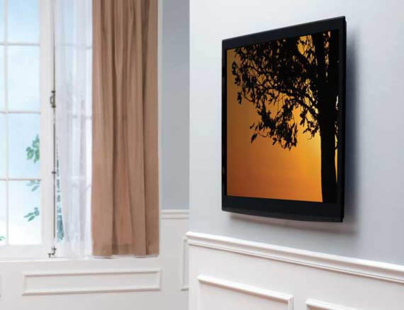 SANUS LL11 ultra slim TV mount installed with 40\" TV positioned 0.55\" from wall