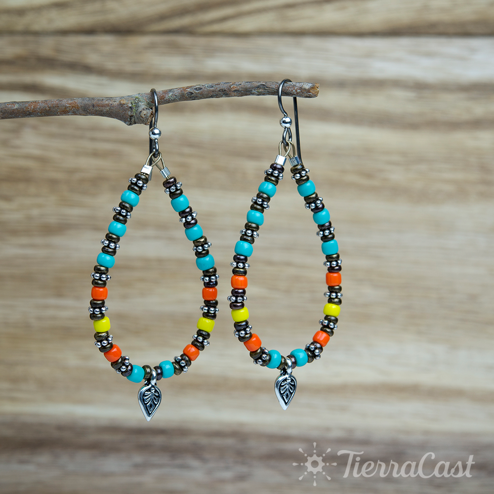 summer-tide-earrings-w-logo-1000px.png