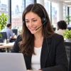 Office worker taking a call wearing the Eartec Office 308 monaural headset in a modern UK office