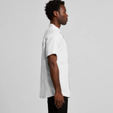 A button-up short-sleeve shirt in light grey, featuring a collar and a branding logo.