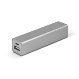A silver power bank with two USB ports, featuring a sleek rectangular design and a minimalist appearance.
