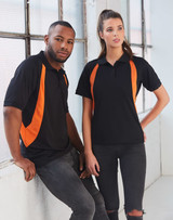 A black polo shirt with orange accents, featuring a logo, displayed on a male and female model.