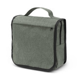 A green toiletry bag with a top handle, featuring a zippered pocket and a textured fabric design.