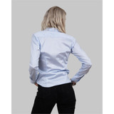 A women's button-up shirt in light blue with a checked pattern, featuring a collar and long sleeves.