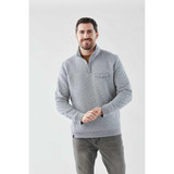 A grey men's pullover sweatshirt featuring a half-zip design and a chest pocket. The model is smiling and standing.