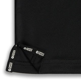 A black polo shirt featuring a mesh fabric design with a logo on the hem.
