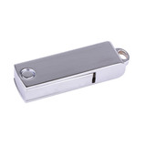 A silver flash drive with a sleek design, featuring a metallic finish and a circular attachment hole.