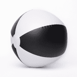 A beach ball with black and white segments, featuring a smooth, inflatable surface and a circular design.