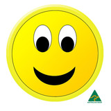 A yellow 44mm button badge featuring a smiling face with large eyes and a friendly expression. It has a logo in the corner.