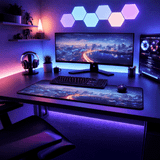 A rubber desk mat featuring a cityscape design on a sleek black surface, complementing a modern office setup.