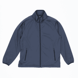 A navy blue bonded jacket with a high collar and side zip pockets, featuring a logo on the chest.