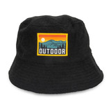 A black terry towelling bucket hat featuring a full colour patch with a mountain and sun design.