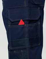 Navy blue semi-fitted Cordura work pants featuring multiple pockets, including a visible pocket with a red item.