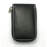 A black faux leather manicure set case with a zip closure and contrasting white stitching.