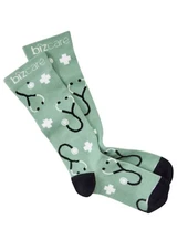 Unisex Happy Feet Comfort Socks in green featuring a stethoscope design and black accents. Includes branding.
