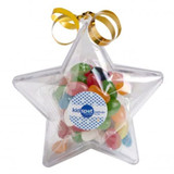 Acrylic star-shaped container filled with colourful jelly beans, topped with golden ribbon and a branded tag.