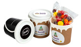 Coffee cups in black and kraft colour featuring mixed Skittles lollies, each with branding stickers.