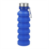 A drink bottle made of blue silicone with a collapsible design and a silver cap. It includes a carabiner attachment.