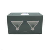 A green box containing a set of two iridescent martini glasses, showcasing a sleek design and elegant shape.