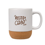 A ceramic mug with a white body and a cork base, featuring a brown logo design.